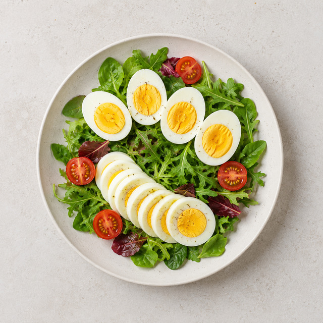 Boiled eggs with avocado and crispbread